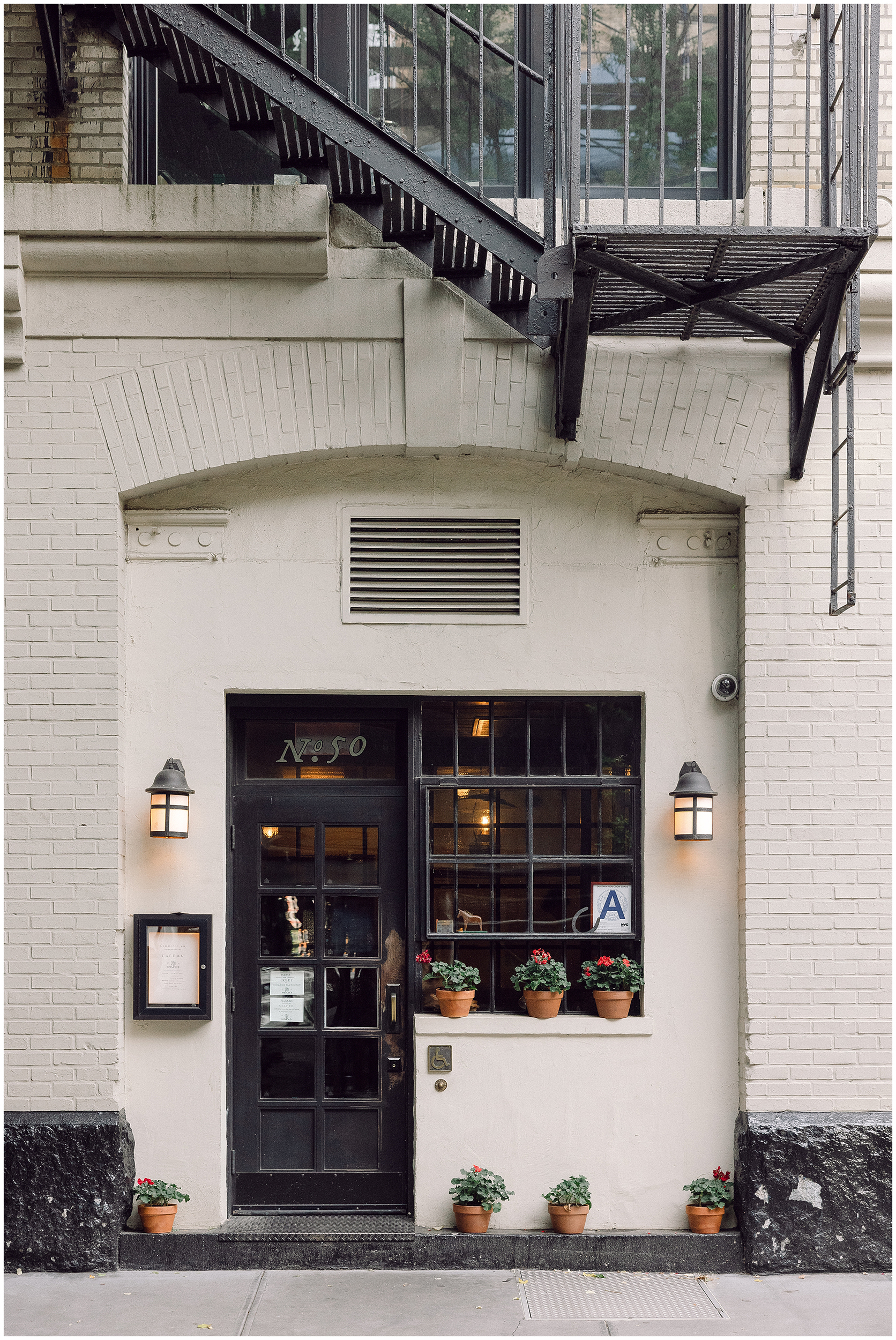 an engagement session in the West Village with a stylish couple